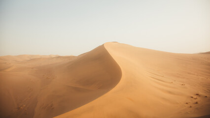Mingsha Mountain and Crescent Lake in Dunhuang, Gansu Province - Desert scenery under clear sky