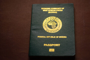 Close Shut of a Green ECOWAS Nigerian passport for tourism and travel