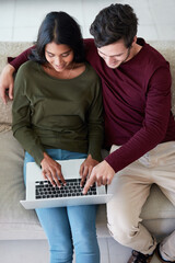Couple, remote work and woman with smile in home, laptop and working with help and relax on sofa....