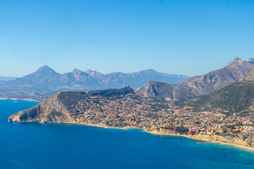 Fototapeta premium Peñón de Ifach Natural Park (Penyal d'Ifac) , Small nature reserve with a large limestone outcrop, trails and panoramic views of Calpe, Mediterranean coast of Alicante and the Gulf of Valencia, Spain.