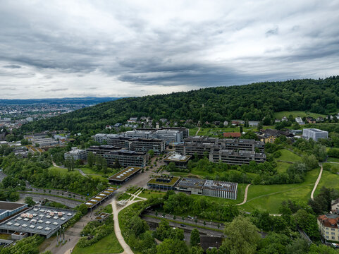 Aerial view of Swiss City of Z&uuml;rich with cityscape and skyline with Irchel campus of University of Z&uuml;rich on a cloudy spring day. Photo taken May 17th, 2024, Zurich, Switzerland.