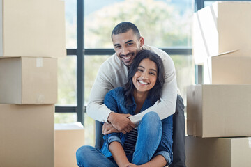 Couple, portrait and box with hug for new home with support, bonding and happiness for dream house....