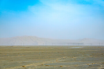 Jiuquan City, Gansu Province - Desert power towers, roads and Gobi scenery