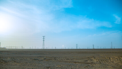 Jiuquan City, Gansu Province - Desert power towers, roads and Gobi scenery
