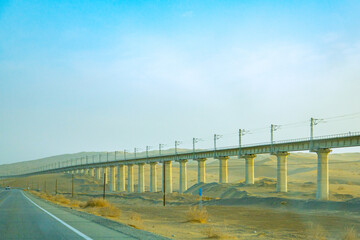 Jiuquan City, Gansu Province - Desert power towers, roads and Gobi scenery