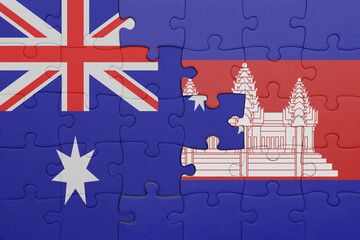 puzzle with the colourful national flag of cambodia and flag of australia.