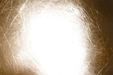 sfondo filtro grunge texture dorato luminoso spiegazzato con spazio vuoto al centro trasparente per sovrapposizione immagine