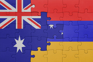 puzzle with the colourful national flag of armenia and flag of australia.