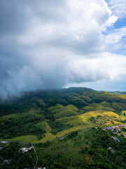 Teletubbies Hill, Nusa Penida, Bali, Indonesia, Beautiful small green hills with clouds, Ariel view...