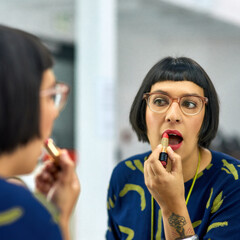 Woman, mirror and beauty with lipstick in home, reflection and event and getting ready with facial...