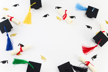 Graduation Celebration Concept. Top view of graduation caps, diplomas, and colorful balloons on...