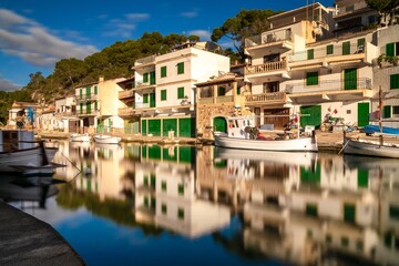 long exposure view of the picturesque village and harbour at Cala Figuera on Mallorca