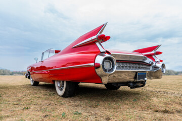 Side view of a classic american car from the fifties. Low angle view