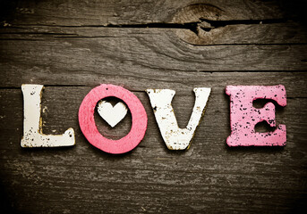 Word Love Letters on Wooden Background