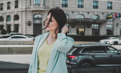 Fototapeta premium Woman thinking about something in big city life . Concept of modern ladies psychology