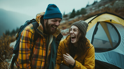 Fototapeta premium couple laughing enjoy together while camping in woods