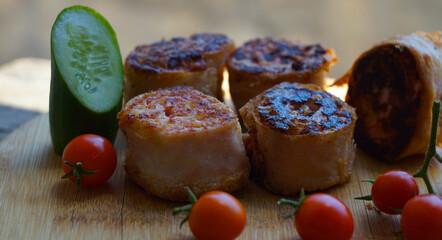 Roulette on the board with wheat and tomatoes