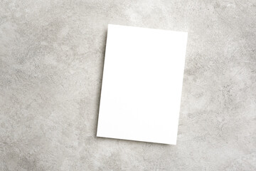 Blank invitation or greeting card mockup on grey background, paper card mock up with copy space