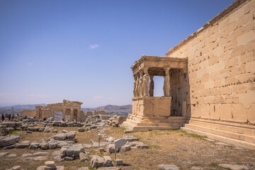 Fototapeta premium Athens, Greece, May 3rd 2024: The Mighty UNESCO Acropolis of Athens, in the center of Athens, Greece