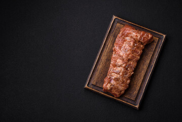Raw pork ribs marinated with salt, spices and herbs