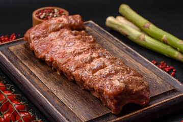Raw pork ribs marinated with salt, spices and herbs