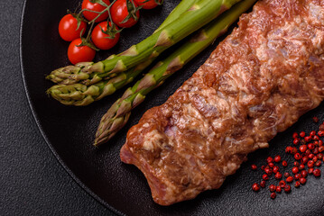 Raw pork ribs marinated with salt, spices and herbs