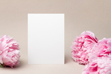 Wedding invitation card mockup with pink peony flowers, white card mock up with copy space