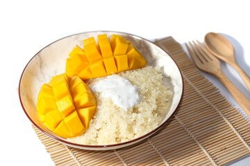 Mango sticky rice put on white background with isolated concept.