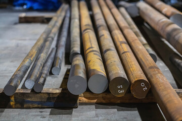 Round long metal billets at a steel mill