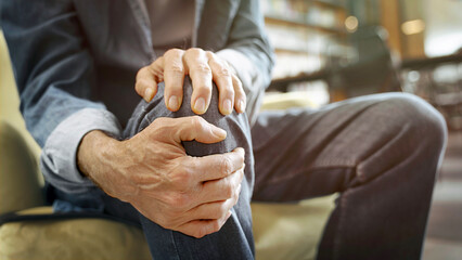 Old man suffering from knee