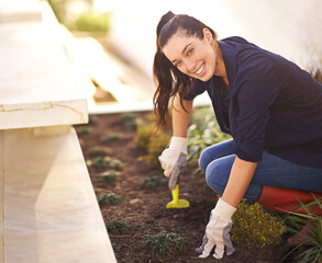 Gardner, portrait and smile for gardening, digging or green growth for eco friendly hobby. Woman,...