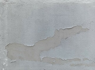 White (shades of grey) wall with cracked plaster. Good for collages, backdrops or other works....