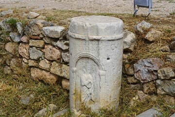 An ancient tomb marker among the ruins of the Roman Agora, in Athens, Greece