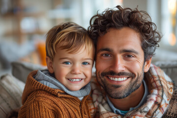 Fototapeta premium Happy father with his son, laughing and playing together isolated on a white background, studio portrait