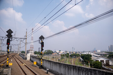 Naklejka premium Railway KRL train near Manggarai station, Jakarta. The KRL train is one of the public transportation options in Jakarta.