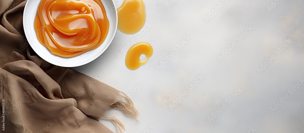 Poster salted caramel on light grey table flat lay space for text. copy space available