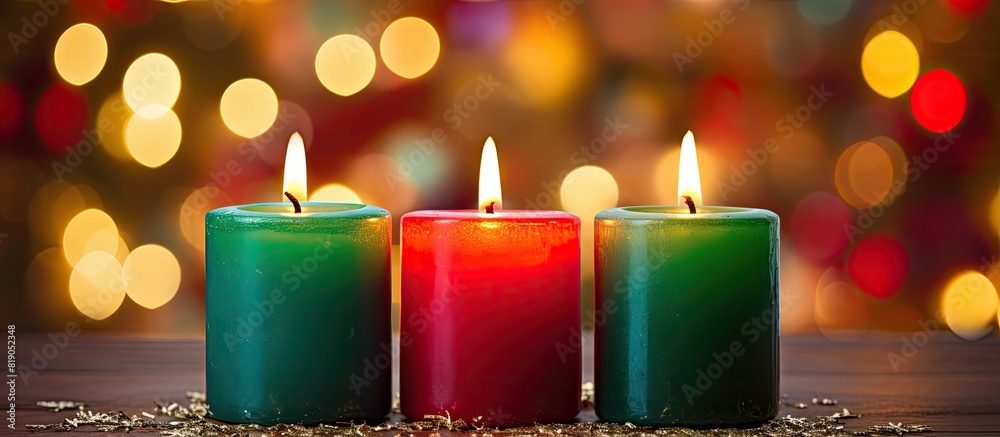 Poster red yellow and green colourful candles with blurred bokeh background christmas and new year copy spa