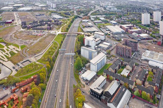 Pedestrian and cycling bridge over the M8 motorway in Glasgow viewed from above