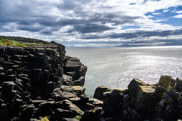 Rocky Shoreline Surrounding a Vast Body of Water