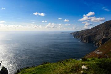 Mountain Lake Alongside Cliff