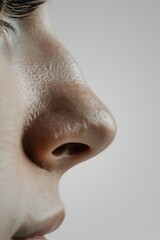 Close up of a person's nose, suitable for medical or beauty concepts