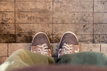 portrait of shoes for travel. Abstract adult male guy worker body modern sporty sole hurry town work house upstair life energy move forward idea concept.