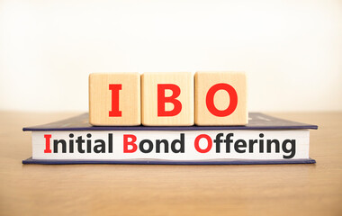 IBO initial bond offering symbol. Concept words IBO initial bond offering on beautiful wooden...