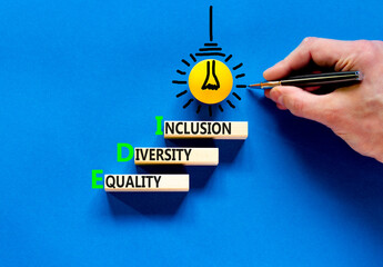 EDI equality diversity inclusion symbol. Concept words EDI equality diversity inclusion on blocks....