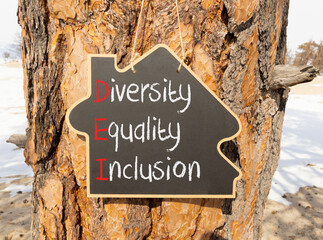 DEI diversity equality inclusion symbol. Concept words DEI diversity equality inclusion on yellow...