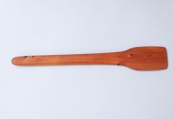 Wooden kitchen utensils stacked view, spoon and spatula