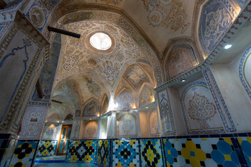 Interior view of the bathhouse of Sultan Amir Ahmed, with its ornate frescoes and tiles. Kashan,...