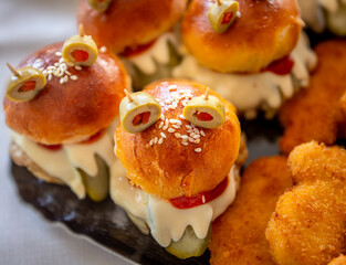 Mini burger with chicken and green olives