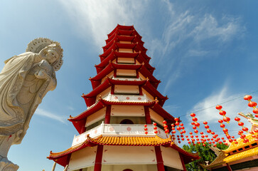 Guanyin Stone Statue and Pagoda at Peak Nam Tong Buddhist Temple in Kota Kinabalu, Sabah, Malaysia