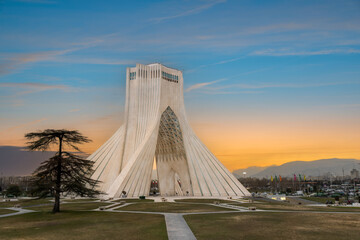 At sunset, locals enjoy a leisurely evening at this iconic landmark in Tehran, the capital of Iran....